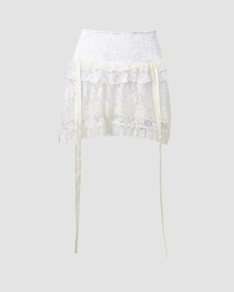 Orietta – Adjustable side drawstrings – Ruffled mini skirt