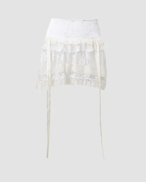 Orietta – Adjustable side drawstrings – Ruffled mini skirt